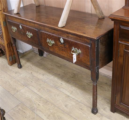 A late18th century oak two drawer dresser base W.136cm